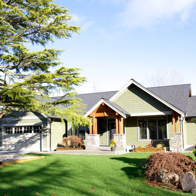 Inspiration for a timeless green exterior home remodel in Vancouver