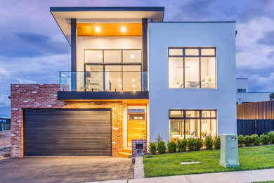 Contemporary split-level brick house exterior in Canberra - Queanbeyan.
