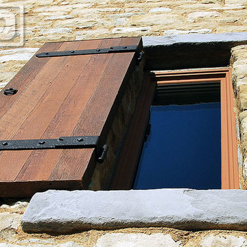 Tuscan Style Window Shutters in Reclaimed Wood & Rustic Hardware