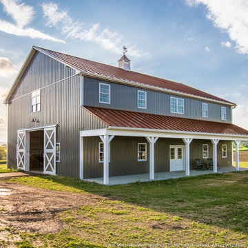 Two Story Pole Barn with Colonial Red ABSeam Roof and Charcaol ABM Panel Sides