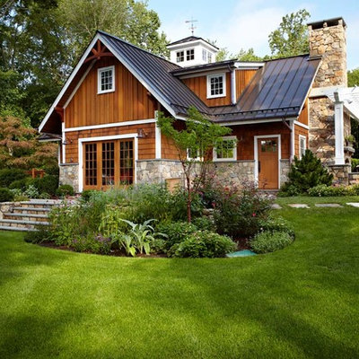 Elegant exterior home photo in New York with a metal roof