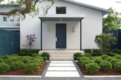 Contemporary white exterior home idea in Houston