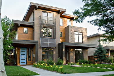 デンバーにあるコンテンポラリースタイルのおしゃれな家の外観 (混合材サイディング、デュープレックス) の写真