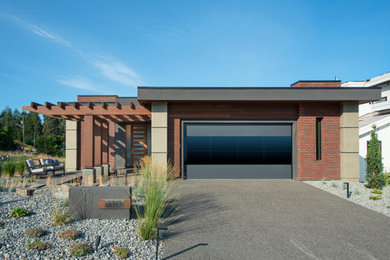 Foto de fachada de casa beige contemporánea de tamaño medio de una planta con revestimiento de estuco y tejado plano
