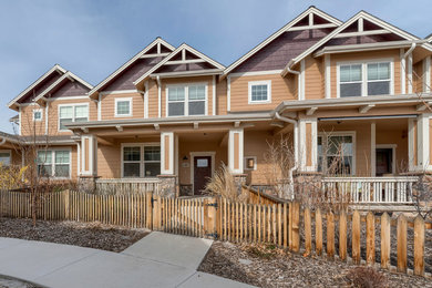Example of a country exterior home design in Denver
