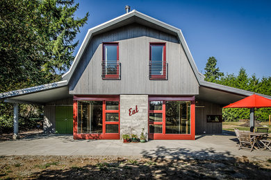This is an example of a rural house exterior in Seattle with stone cladding.