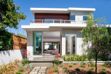 Trendy wood exterior home photo in Los Angeles