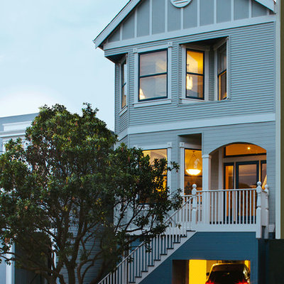Inspiration for a large victorian three-story wood gable roof remodel in San Francisco