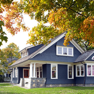 Inspiration for a timeless blue two-story exterior home remodel in New York