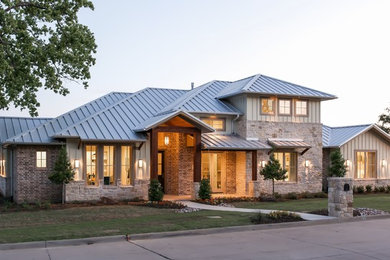 Mid-sized craftsman gray two-story mixed siding exterior home idea in Dallas