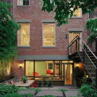 Design ideas for a red traditional brick house exterior in New York.