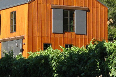 This is an example of a farmhouse two floor house exterior in San Francisco.