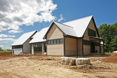 Exemple d'une façade de maison tendance.