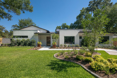 Inspiration for a mid-century modern exterior home remodel in Houston