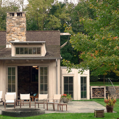 Example of a classic wood exterior home design in New York