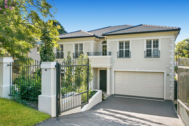 Example of a large two-story house exterior design in Sydney with a tile roof