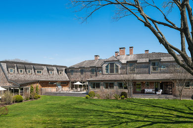 This is an example of a beach style house exterior in New York.