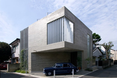 東京23区にあるモダンスタイルのおしゃれな家の外観 (コンクリートサイディング) の写真