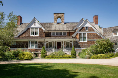 Example of a large classic exterior home design in New York