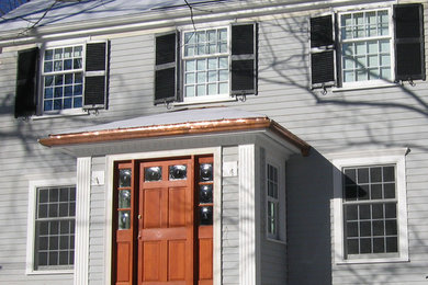 Réalisation d'une façade de maison tradition.