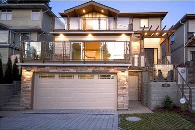 Large trendy beige three-story mixed siding house exterior photo in Vancouver with a hip roof and a shingle roof