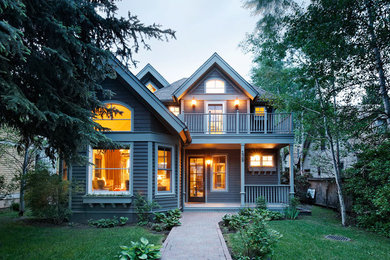 Gey traditional two floor house exterior in Denver.