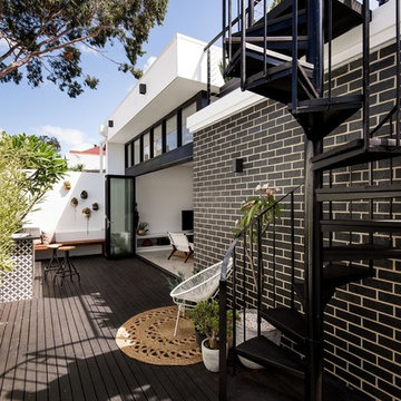 West Leederville Residence - Courtyard with spiral stair leading to roof deck