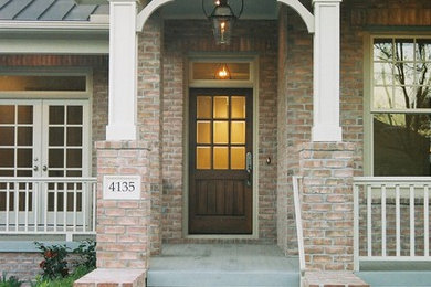 Inspiration for a large craftsman two-story brick exterior home remodel in Houston