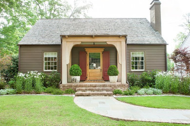 Example of a classic brown one-story gable roof design in Atlanta