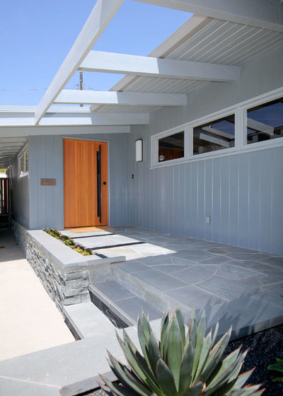Midcentury Exterior by JWT Associates