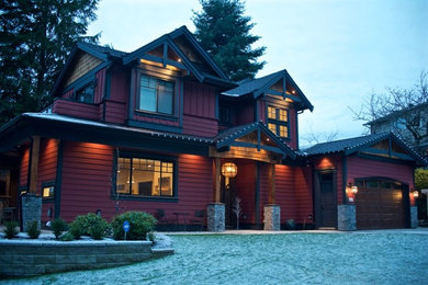 Design ideas for a large and red classic two floor house exterior in Vancouver with wood cladding and a pitched roof.