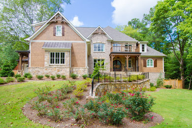 Mid-sized craftsman beige two-story mixed siding gable roof idea in Atlanta