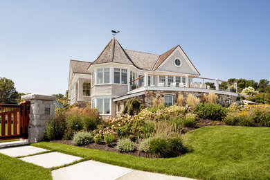 Beach style beige wood exterior home photo in Portland Maine