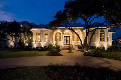 Inspiration for a large transitional two-story exterior home remodel in Houston