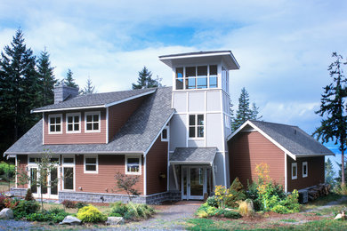 Mid-sized traditional two-story concrete fiberboard exterior home idea in Seattle