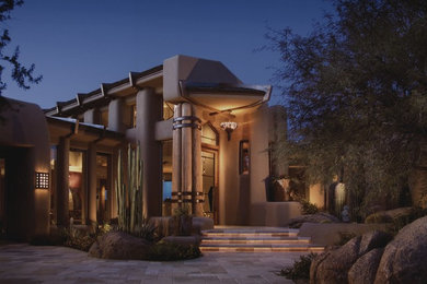 Example of an eclectic exterior home design in Phoenix