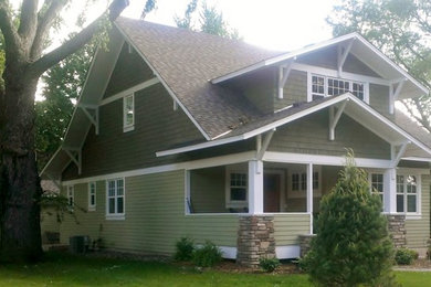 Example of a mid-sized trendy gray two-story wood exterior home design in Minneapolis