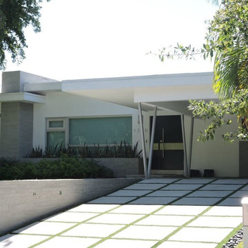White Modern Exterior - Rodriguez Residence