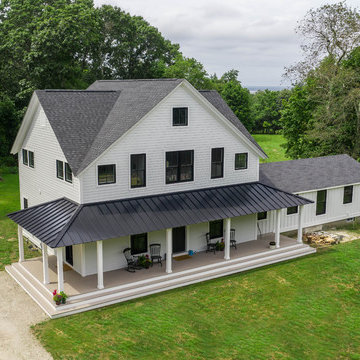 White Modern Farmhouse with James Hardie Fiber Cement Siding and Mira Windows