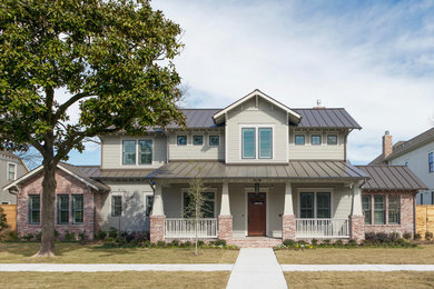 Inspiration for a huge transitional brown two-story house exterior remodel in Houston with a metal roof and a brown roof