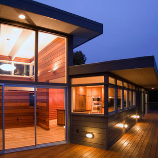 Idee per la facciata di una casa moderna con rivestimento in legno