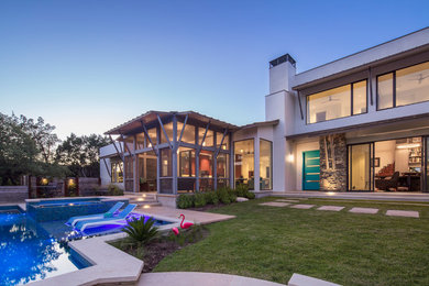 Inspiration for a transitional exterior home remodel in Austin