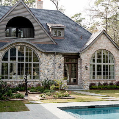 Inspiration for a timeless stone exterior home remodel in Houston