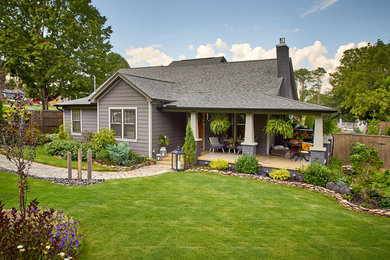 Inspiration for a small craftsman gray wood exterior home remodel in Other with a shingle roof