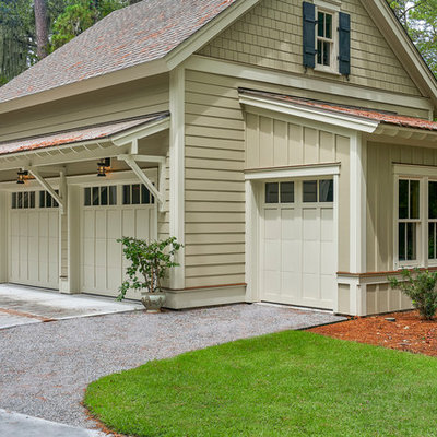 Mid-sized transitional beige two-story concrete fiberboard exterior home idea in Charleston with a shingle roof