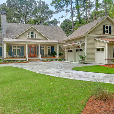 Mid-sized transitional gray two-story concrete fiberboard exterior home idea in Charleston with a shingle roof