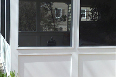 Example of a white exterior home design in Philadelphia