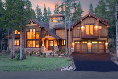 Rustic two-story wood gable roof idea in Denver