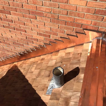 Winnetka, IL : cedar shingle roof replacement- custom copper roof fabrication