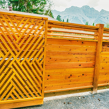 Wood Fence with Intricate Wood Gate